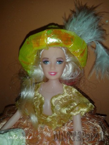 Шляпку сделала из платья,которое было на кукле,по моему очень даже ничего!